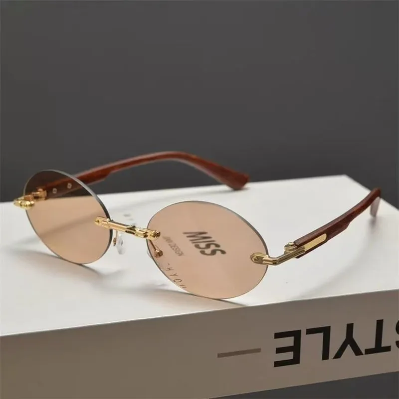 New Sexy Small Frame Rimless Punk Sunglasses Women Luxury Brand Sun Glasses For Lady Frameless Eyewear UV400 Glasses
New Sexy Small Frame Rimless Punk Sunglasses Women Luxury Brand Sun Glasses For Lady Frameless Eyewear UV400 Glasses