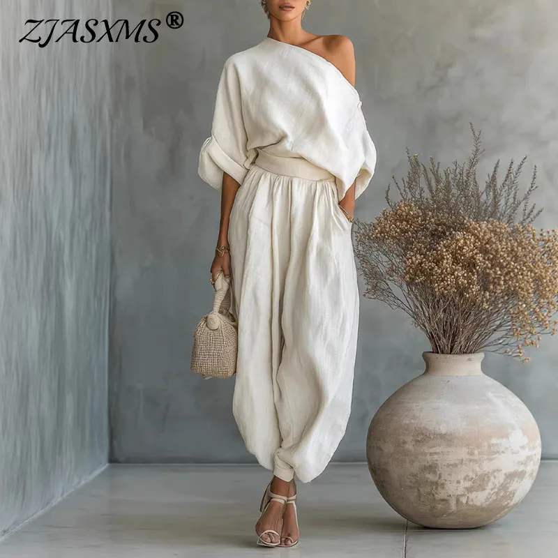 Элегантный топ с длинными рукавами и повседневные брюки с косым воротником, женский сексуальный однотонный костюм с вырезами, весенне-осенний свободный женский костюм
Элегантный топ с длинными рукавами и повседневные брюки с косым воротником, женский сексуальный однотонный костюм с вырезами, весенне-осенний свободный женский костюм