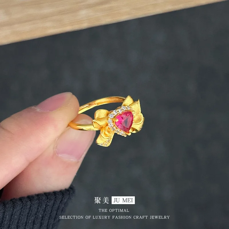 Women's Bow Open Ring, 24K Gold, AU999 | Solid gold bow with diamond center, "Sweetness" engraving inside.
Women's Bow Open Ring, 24K Gold, AU999 | Solid gold bow with diamond center, "Sweetness" engraving inside.