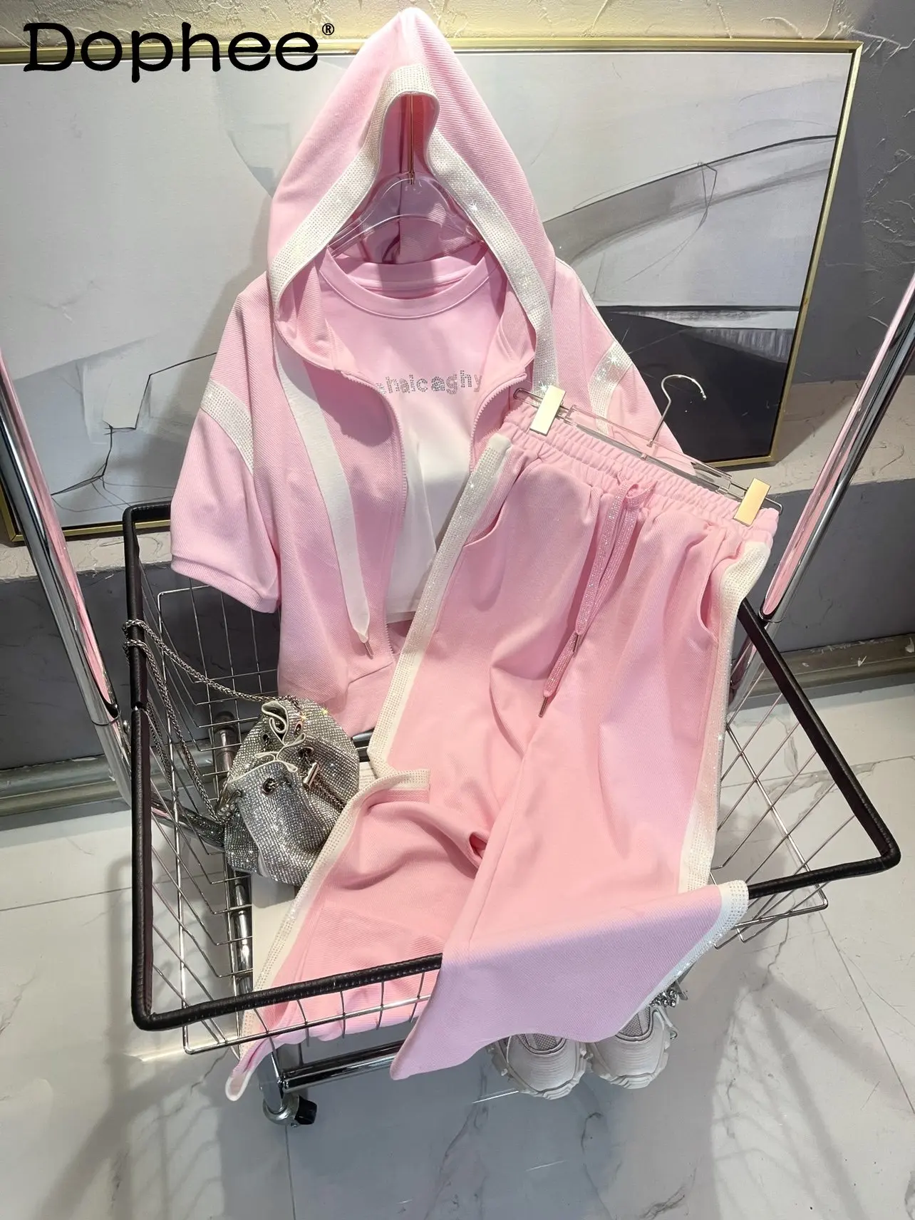 Pink Sports Suit Hot Drilling Hooded Short Sleeve Hoodie Straight Sports Pants Two-Piece Set Women Spring and Summer Pants Sets
Pink Sports Suit Hot Drilling Hooded Short Sleeve Hoodie Straight Sports Pants Two-Piece Set Women Spring and Summer Pants Sets