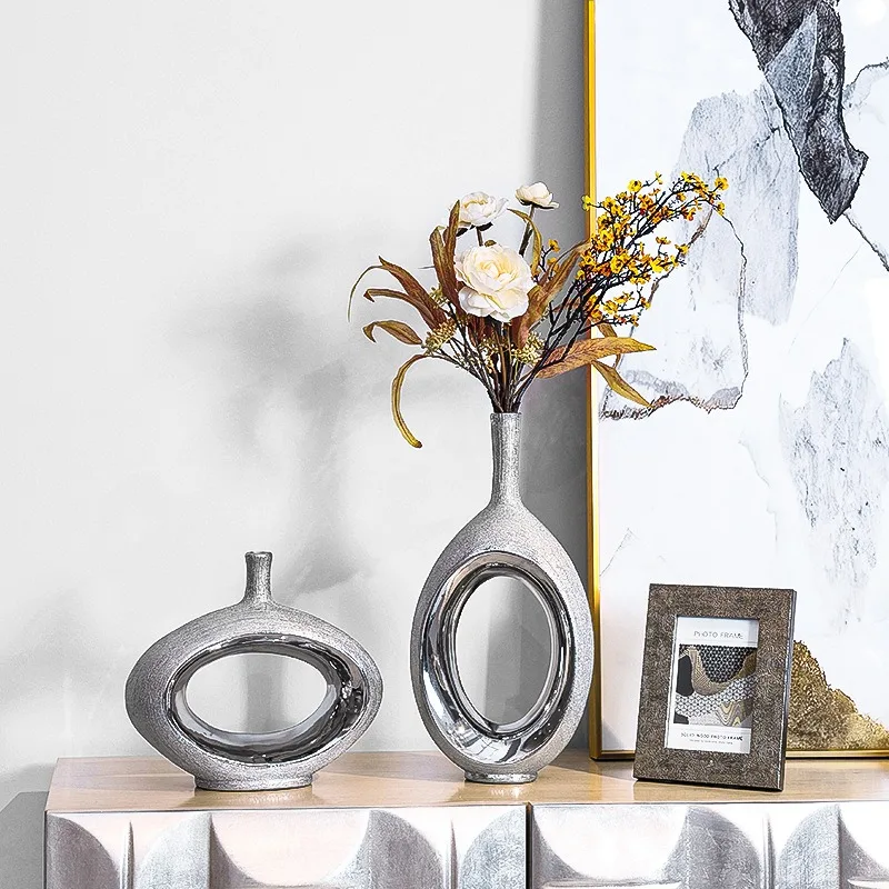 Modern simple ornaments, TV cabinets, Nordic light luxury vases, living room wine cabinets, home art accessories
Modern simple ornaments, TV cabinets, Nordic light luxury vases, living room wine cabinets, home art accessories