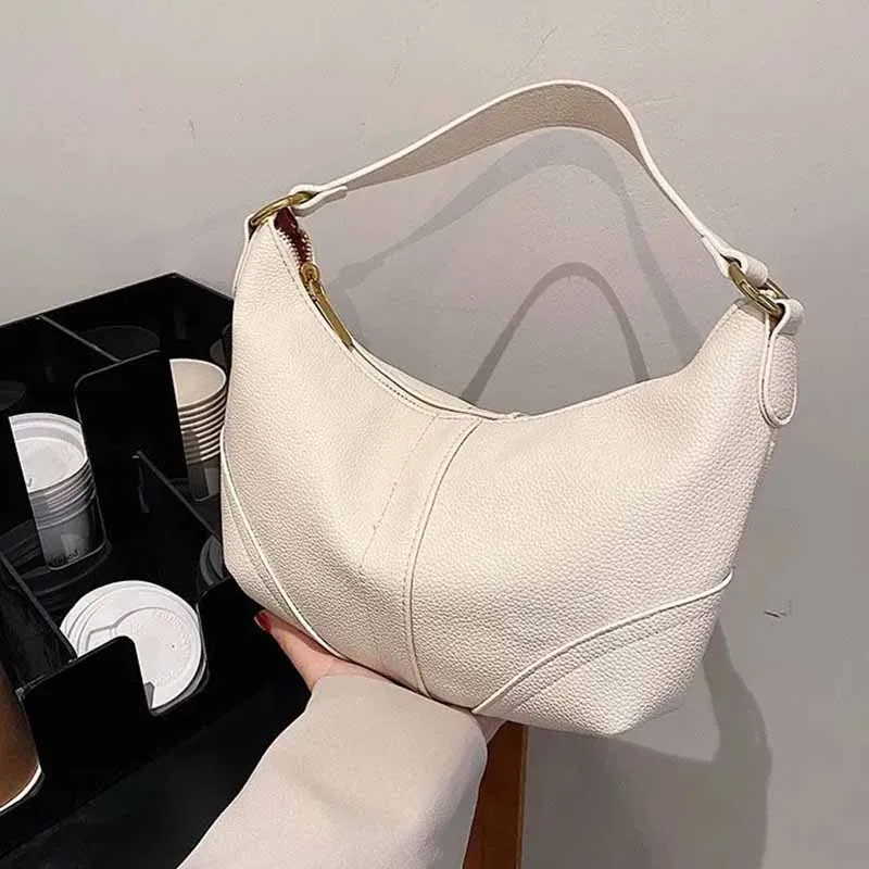 New Retro Dumpling Bag Armpit Bag Korean Style Fashion Casual Soft Leather Dumpling Bag Luxury Texture Shoulder Handbag 2023
New Retro Dumpling Bag Armpit Bag Korean Style Fashion Casual Soft Leather Dumpling Bag Luxury Texture Shoulder Handbag 2023