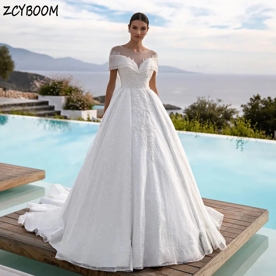 Elegant O-Neck Sequin Beaded Appliques Short sleeves Wedding Dress 2023 A-Line Floor Length Sweep Train Pretty Bridal Gown
Elegant O-Neck Sequin Beaded Appliques Short sleeves Wedding Dress 2023 A-Line Floor Length Sweep Train Pretty Bridal Gown