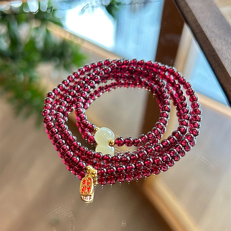 4mm Natural wine red garnet multi circle bracelet with white display paired with lucky luck brand zodiac year transfer bracelet
4mm Natural wine red garnet multi circle bracelet with white display paired with lucky luck brand zodiac year transfer bracelet