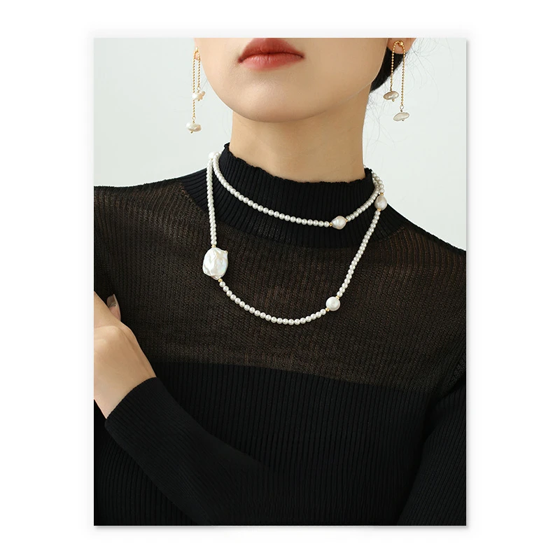 European and American fashion light luxury temperament a variety of ways to wear natural baroque pearl sweater chain
European and American fashion light luxury temperament a variety of ways to wear natural baroque pearl sweater chain