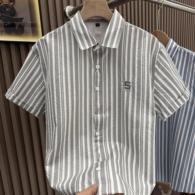 Summer Thin Iron-Free Bubble Fabric Stripe Ice Silk Short Sleeve Slim Fit Business Embroidered Shirt Men's Fashion Casual Wear
Summer Thin Iron-Free Bubble Fabric Stripe Ice Silk Short Sleeve Slim Fit Business Embroidered Shirt Men's Fashion Casual Wear