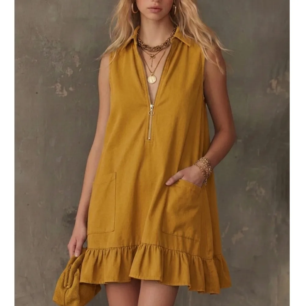 Women's Summer Casual Sleeveless Zipper Mini Dress Vintage Turn Down Collar Ruffle Hem Loose Fit Sundress Beach Holiday Outfit
Women's Summer Casual Sleeveless Zipper Mini Dress Vintage Turn Down Collar Ruffle Hem Loose Fit Sundress Beach Holiday Outfit