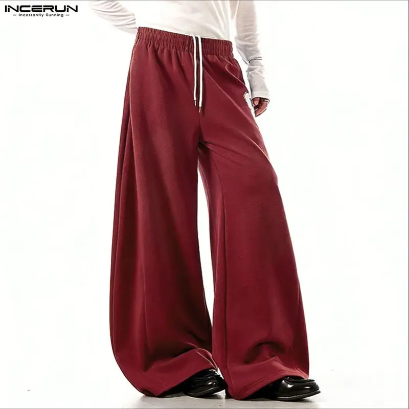 Мужские брюки INCERUN с принтом, на резинке, свободные, повседневные, широкие штаны, мужская уличная одежда, модные длинные брюки для тренировок 2026
Мужские брюки INCERUN с принтом, на резинке, свободные, повседневные, широкие штаны, мужская уличная одежда, модные длинные брюки для тренировок 2026