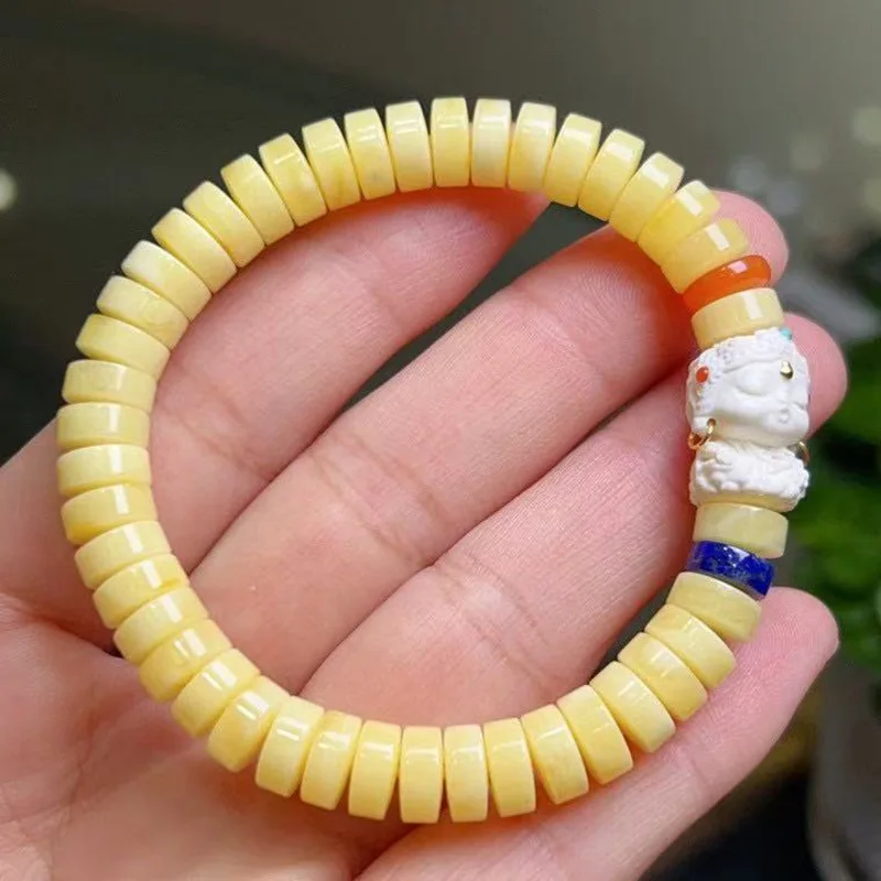 White Flower Amber Tablet with Mammoth Ivory Tara Bracelet
White Flower Amber Tablet with Mammoth Ivory Tara Bracelet