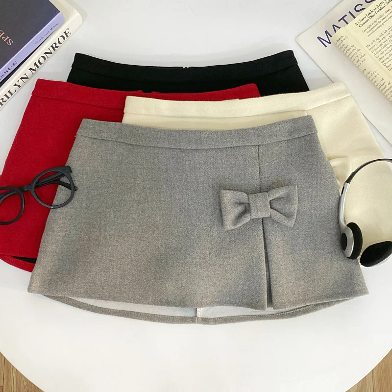 Укороченная шерстяная юбка А-силуэта с низкой талией, разрезом и узлом, в корейском стиле, для повседневной носки
Укороченная шерстяная юбка А-силуэта с низкой талией, разрезом и узлом, в корейском стиле, для повседневной носки