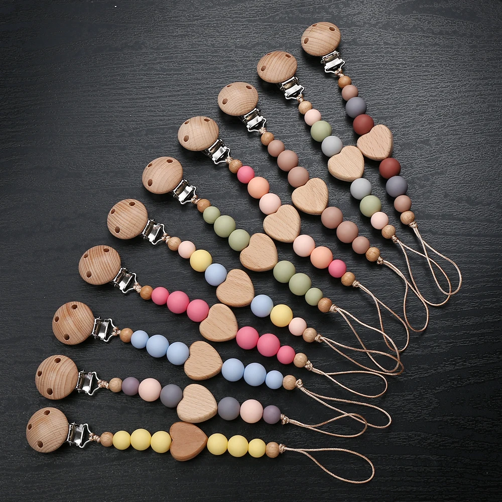 Beech Wooden Heart Beads Baby Pacifier Chain Clip Silicone Beads Dummy Nipple Holder Teether Pendant for Newborn Toys Gift
Beech Wooden Heart Beads Baby Pacifier Chain Clip Silicone Beads Dummy Nipple Holder Teether Pendant for Newborn Toys Gift