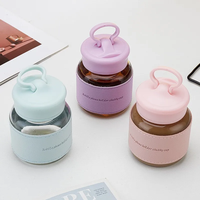 1PCS 300ml Glass Water Bottle Cute Kawaii Mini Glass Cup With Insulative Sleeve Phone Holder Cup with Handle Drinking Bottles
1PCS 300ml Glass Water Bottle Cute Kawaii Mini Glass Cup With Insulative Sleeve Phone Holder Cup with Handle Drinking Bottles