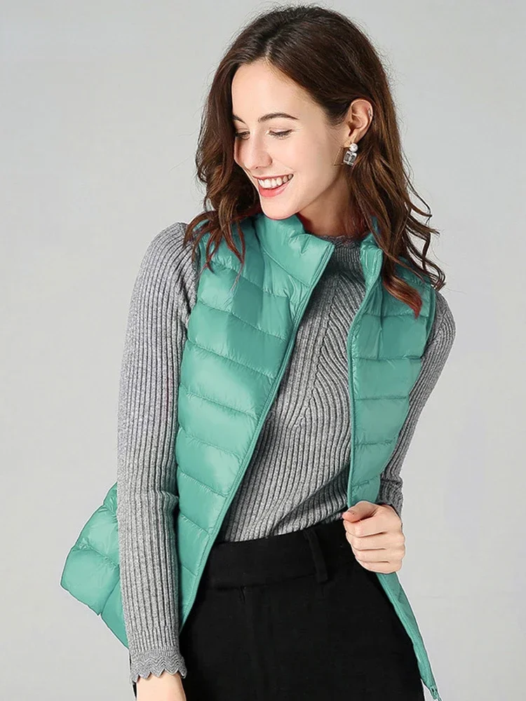 Pop Women Down Vest Ultralight Thin Sleeveless Jacket White Duck Down Winter Tops Spring Autumn Female Portable Outwear
Pop Women Down Vest Ultralight Thin Sleeveless Jacket White Duck Down Winter Tops Spring Autumn Female Portable Outwear
