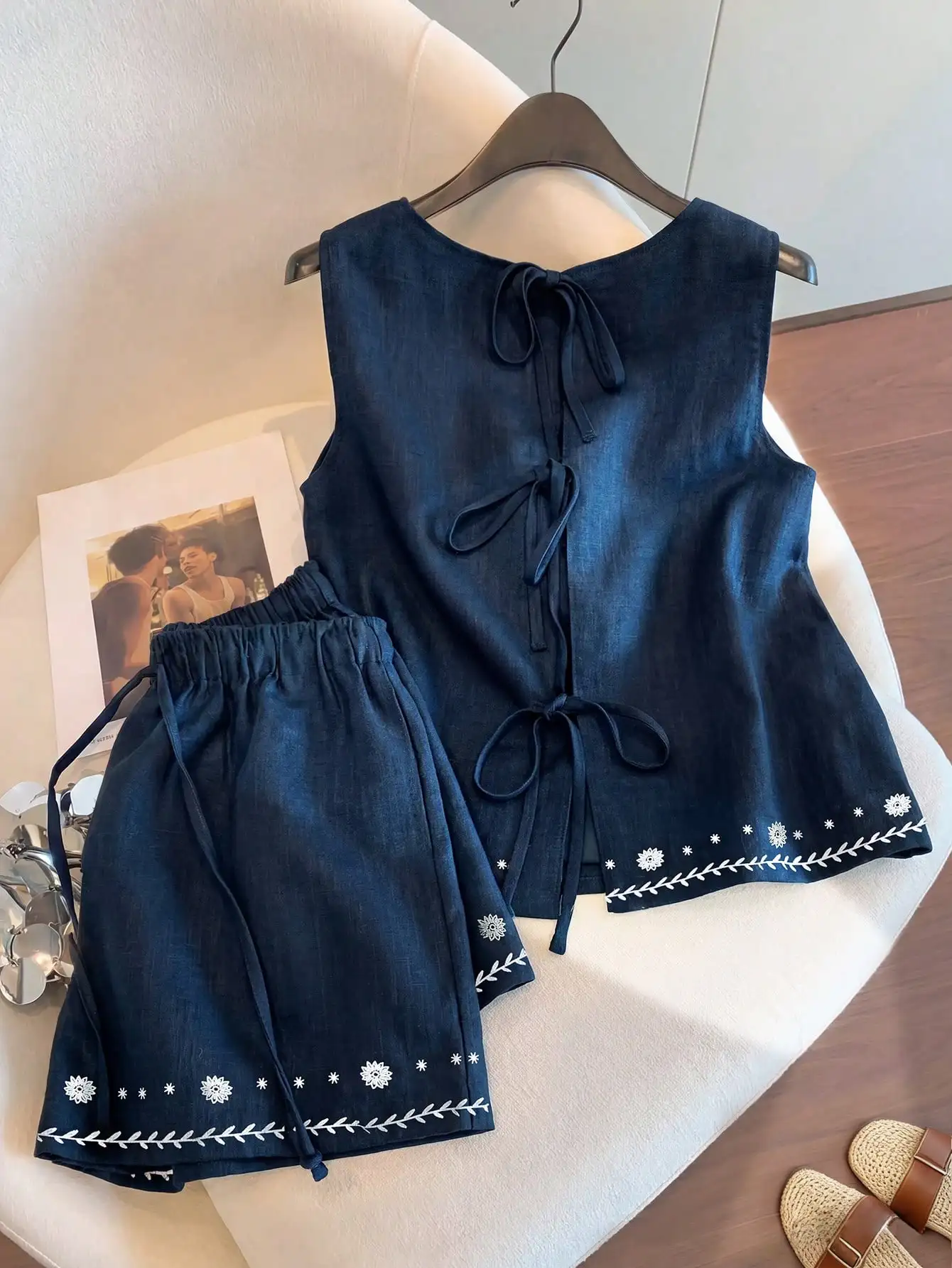 Women Sleeveless Round Neck Linen Two-Piece Set With Embroidery Floral Detail Casual Summer Shorts Set
Women Sleeveless Round Neck Linen Two-Piece Set With Embroidery Floral Detail Casual Summer Shorts Set