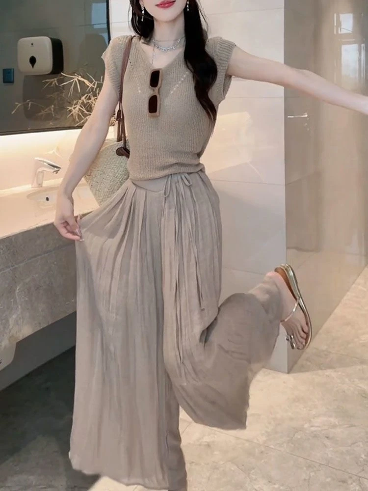 Summer 2026 Tea Hollow out Short Sleeve Knitted Top Wide Leg Pants Two Piece Set Loose Feelings Ensemble Casual Sportswear
Summer 2026 Tea Hollow out Short Sleeve Knitted Top Wide Leg Pants Two Piece Set Loose Feelings Ensemble Casual Sportswear