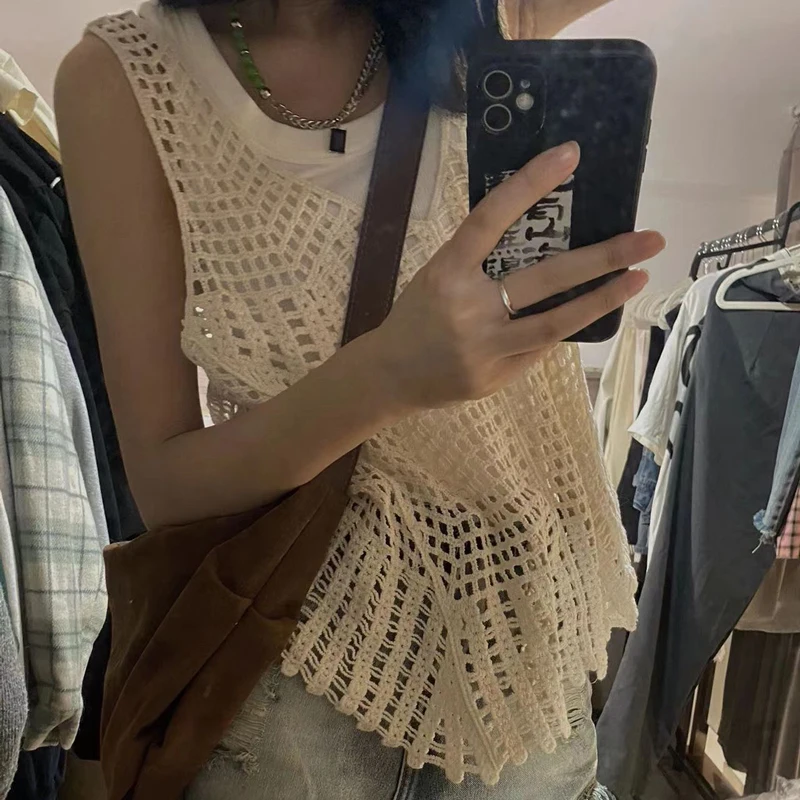 Korean Style Hollow out Knitted Strap Vest Women's Summer New Design Loose Outerwear Short Sleeveless Top for Young Girls
Korean Style Hollow out Knitted Strap Vest Women's Summer New Design Loose Outerwear Short Sleeveless Top for Young Girls