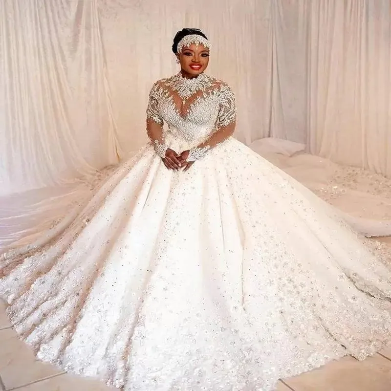 Morden Beaded Crystals High Neck Ballgown Luxury Wedding Dresses Illusion Long Sleeves 3 D Florals Appliques Bridal Dresses
Morden Beaded Crystals High Neck Ballgown Luxury Wedding Dresses Illusion Long Sleeves 3 D Florals Appliques Bridal Dresses
