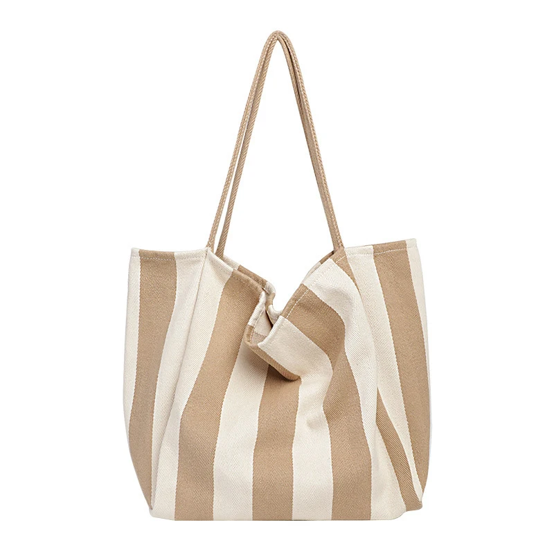 Korean minimalist retro handbag, trendy and fresh striped canvas women's bag, casual and artistic large-capacity shoulder bag
Korean minimalist retro handbag, trendy and fresh striped canvas women's bag, casual and artistic large-capacity shoulder bag