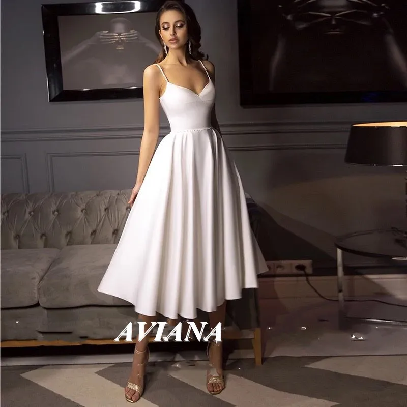 Charming A-Line Short Spaghetti Straps Wedding Dress For Women Waist Pearls Tea Length Bridal Gowns Custom Made
Charming A-Line Short Spaghetti Straps Wedding Dress For Women Waist Pearls Tea Length Bridal Gowns Custom Made