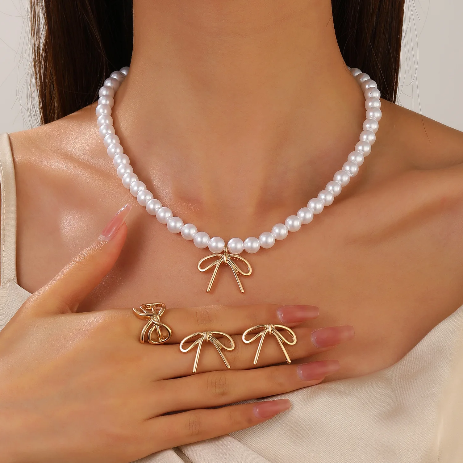 Retro Unique Design Bow Pearl Necklace Earrings Rings Paty Jewelry Sets for Women Sweet Temperament Accessory Gifts Sets
Retro Unique Design Bow Pearl Necklace Earrings Rings Paty Jewelry Sets for Women Sweet Temperament Accessory Gifts Sets