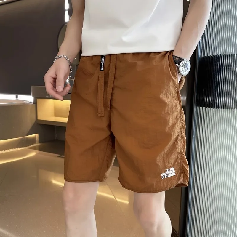 Мужские повседневные спортивные брюки-капри, летние, новые, свободного кроя, тонкие, быстросохнущие, модные, для активного отдыха, молодежные
Мужские повседневные спортивные брюки-капри, летние, новые, свободного кроя, тонкие, быстросохнущие, модные, для активного отдыха, молодежные