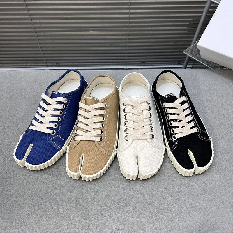 2026 Unisex Canvas Tabi Sneakers Men’s Women’s Split Toe Flats Women Low Top Tabi Shoes Pig Hoof Shoes Woman Loafers
2026 Unisex Canvas Tabi Sneakers Men’s Women’s Split Toe Flats Women Low Top Tabi Shoes Pig Hoof Shoes Woman Loafers