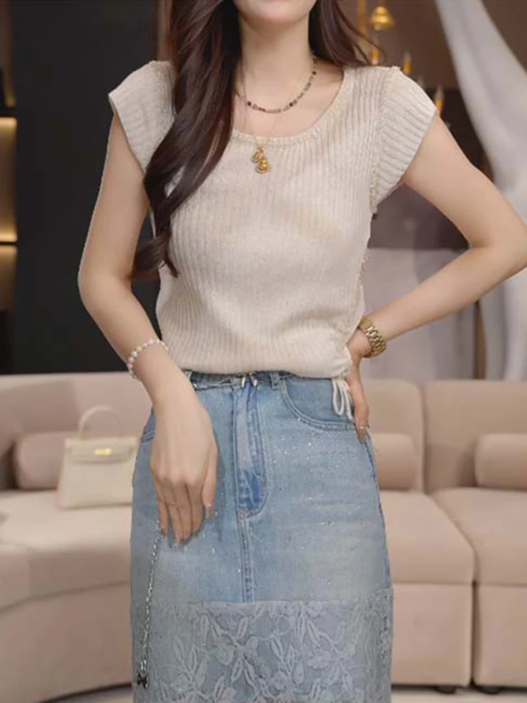 Модный летний вязаный топ с коротким рукавом для женщин, универсальная облегающая футболка в европейском стиле
Модный летний вязаный топ с коротким рукавом для женщин, универсальная облегающая футболка в европейском стиле
