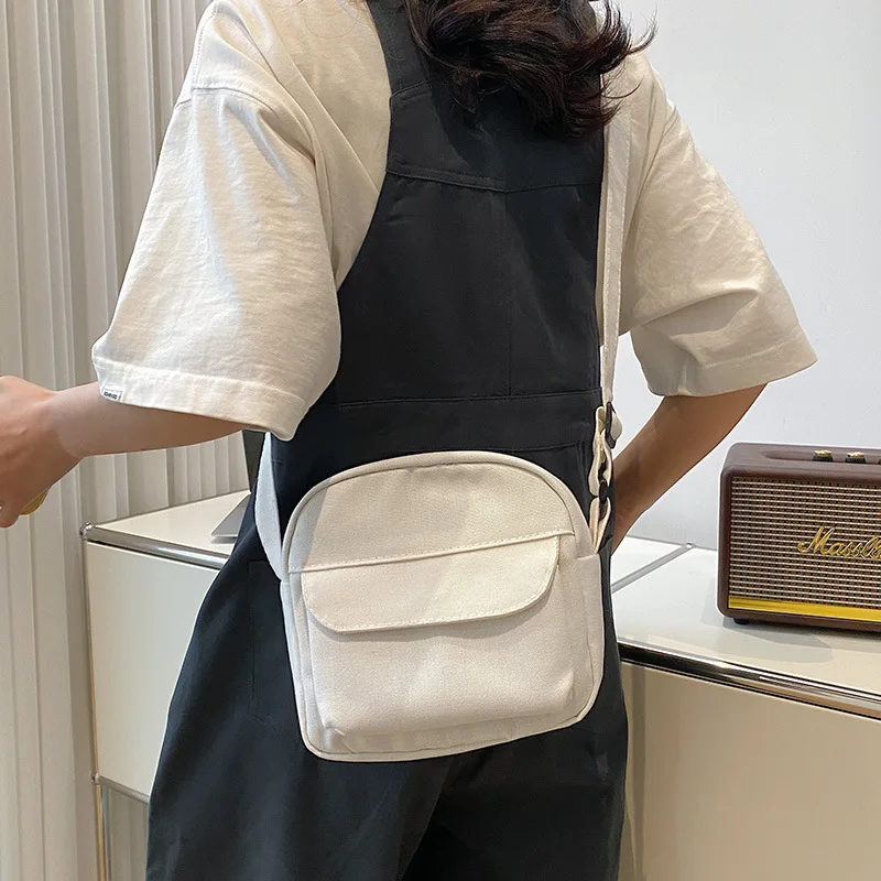 Fashion Women Canvas Shoulder Handbags Korean Solid Color Student Phone Purse Simple Zipper Small Messenger Crossbody Pouch
Fashion Women Canvas Shoulder Handbags Korean Solid Color Student Phone Purse Simple Zipper Small Messenger Crossbody Pouch