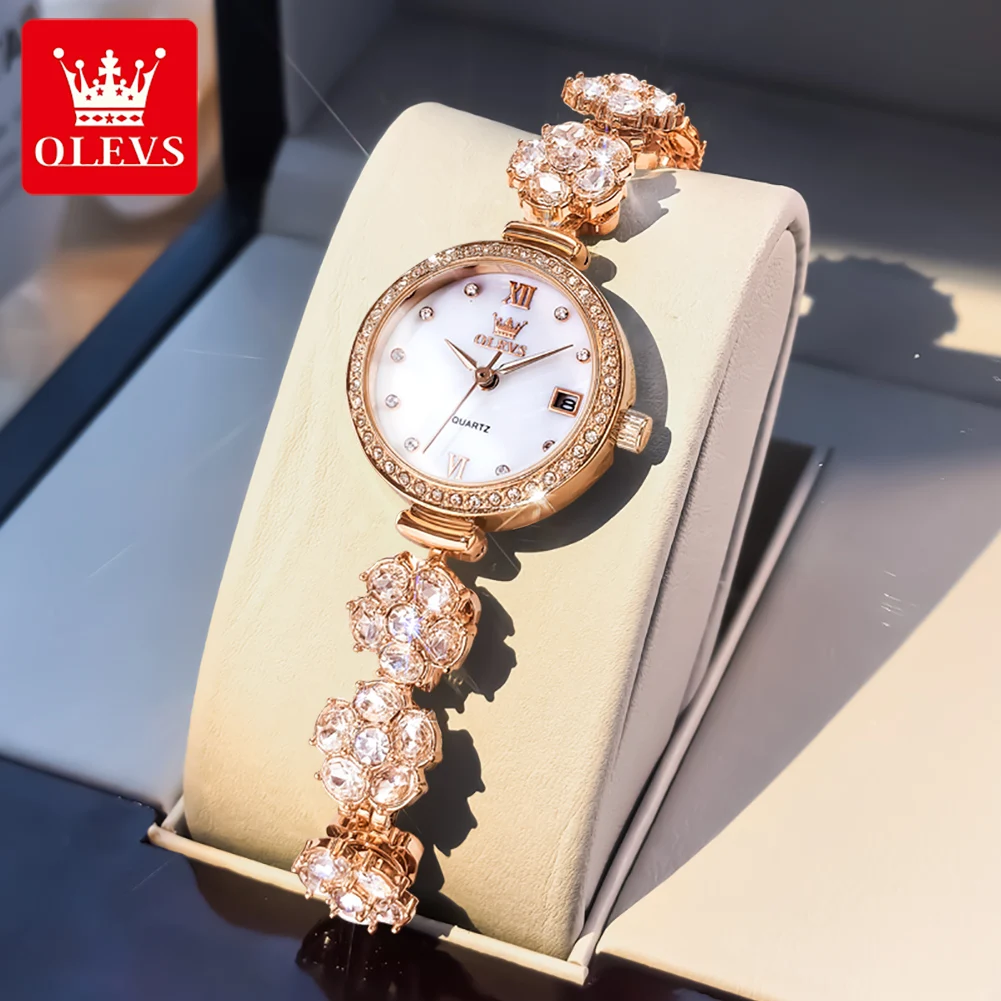 OLEVS женские часы, роскошные модные часы из нержавеющей стали с цирконием и цветком, оригинальные кварцевые наручные часы для женщин, водонепроницаемые, новинка с датой
OLEVS женские часы, роскошные модные часы из нержавеющей стали с цирконием и цветком, оригинальные кварцевые наручные часы для женщин, водонепроницаемые, новинка с датой