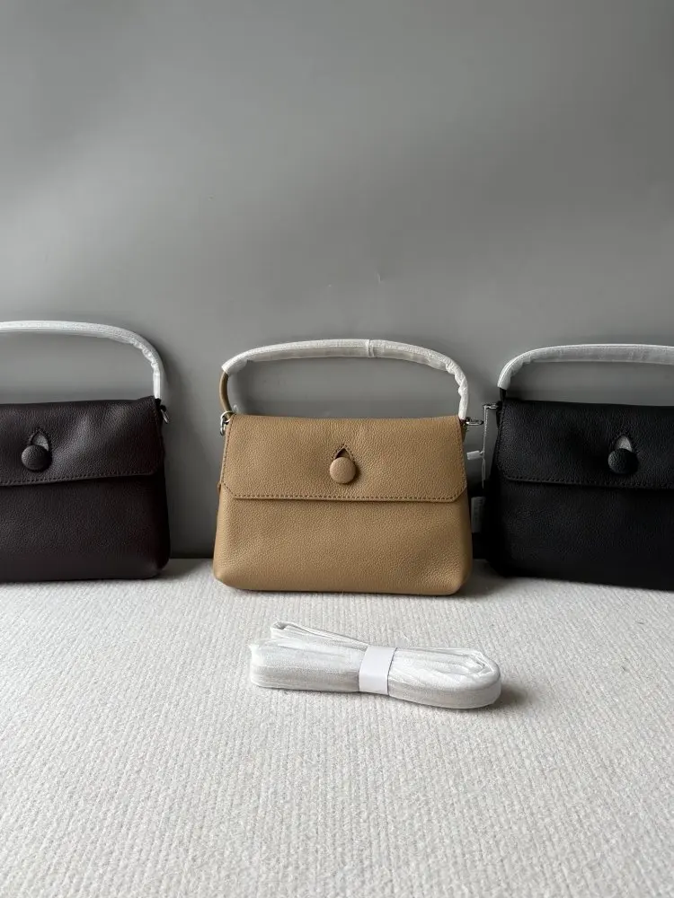 New Spring Summer Genuine Top-Grain Calfskin Button Bag, Luxury Leather Women Hand Pouch, Niche Design Handheld Phone Bag, Daily
New Spring Summer Genuine Top-Grain Calfskin Button Bag, Luxury Leather Women Hand Pouch, Niche Design Handheld Phone Bag, Daily