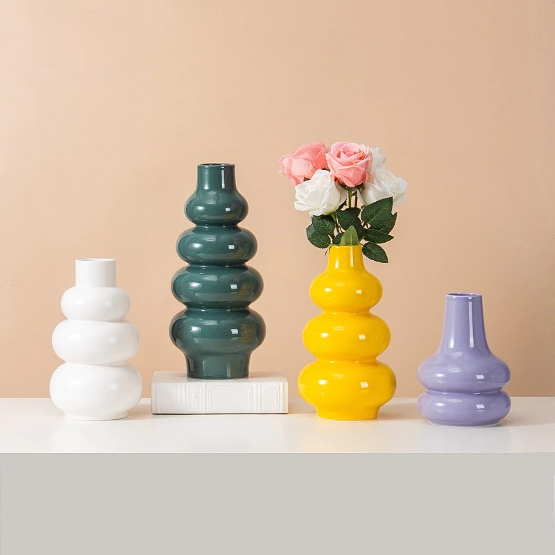 Nordic simple cream circle ceramic vase decoration home living room bedroom dining table art vase decoration wedding decoration
Nordic simple cream circle ceramic vase decoration home living room bedroom dining table art vase decoration wedding decoration