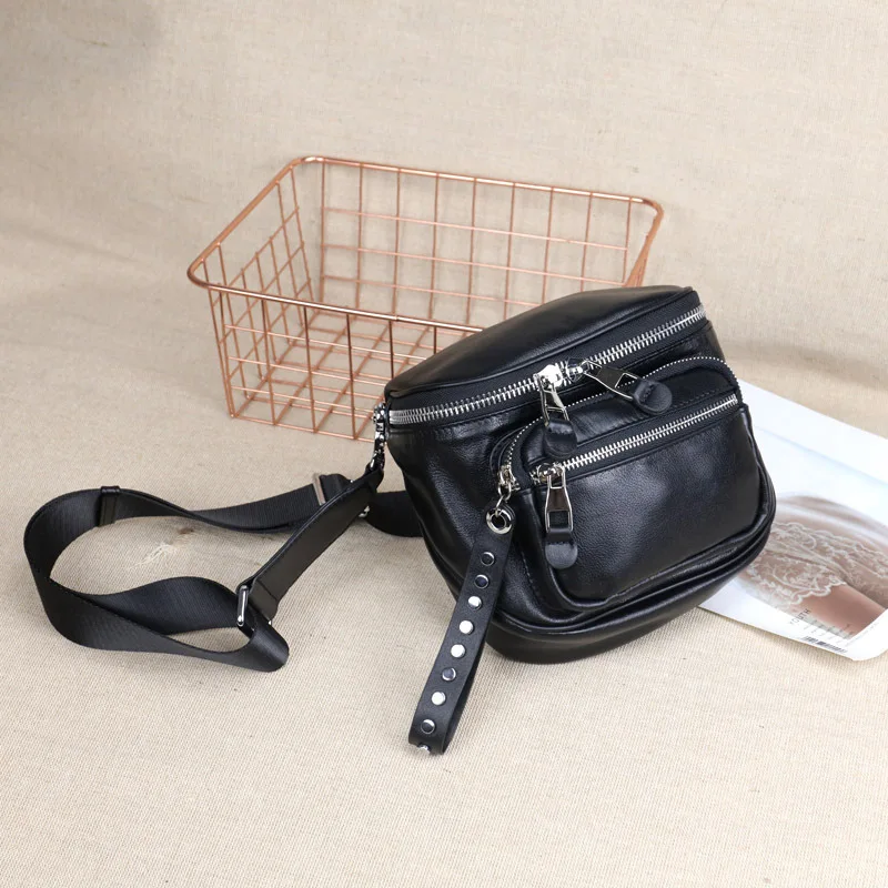 Leather first-layer cowhide cylindrical saddle bag, new niche women's shoulder messenger bag, fashionable, simple and versatile,
Leather first-layer cowhide cylindrical saddle bag, new niche women's shoulder messenger bag, fashionable, simple and versatile,