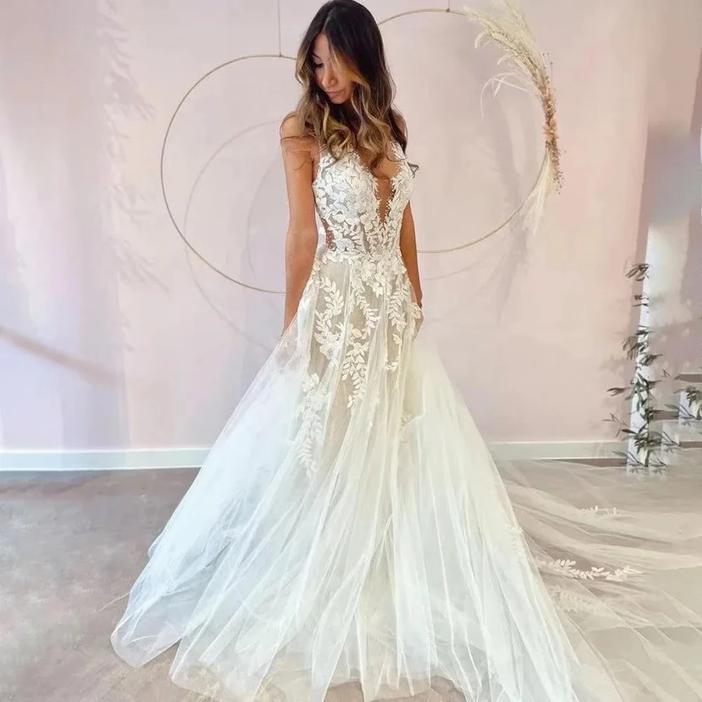 Customized Sexy Deep V Neck Wedding Dress Backless Sleeveless Plus Size Appliqued Vestido de novia A Line Tulle Bridal GownRobe
Customized Sexy Deep V Neck Wedding Dress Backless Sleeveless Plus Size Appliqued Vestido de novia A Line Tulle Bridal GownRobe