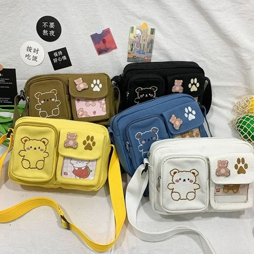 Embroidery Bear Transparent Itabag Zipper Solid Color Canvas Shoulder Bag Multifunction Idol Merchandise Storage Shoulder Bag
Embroidery Bear Transparent Itabag Zipper Solid Color Canvas Shoulder Bag Multifunction Idol Merchandise Storage Shoulder Bag