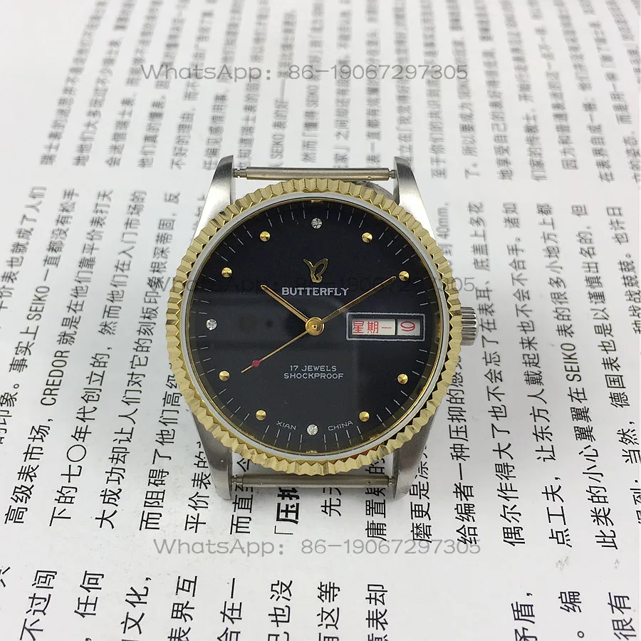 Xi'an Watch Factory, Butterfly Brand All-steel Black Surface Double Calendar Manual Mechanical Watch Diameter 36mm
Xi'an Watch Factory, Butterfly Brand All-steel Black Surface Double Calendar Manual Mechanical Watch Diameter 36mm