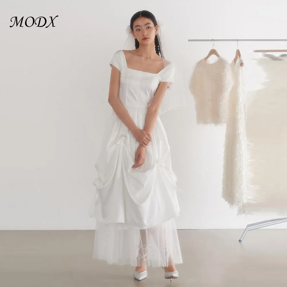 MODX Simple Square Neck Short Sleeve Satin Mesh Long Korean Photography Glitter Bridal Gowns Customized Corset Engagement Dress
MODX Simple Square Neck Short Sleeve Satin Mesh Long Korean Photography Glitter Bridal Gowns Customized Corset Engagement Dress
