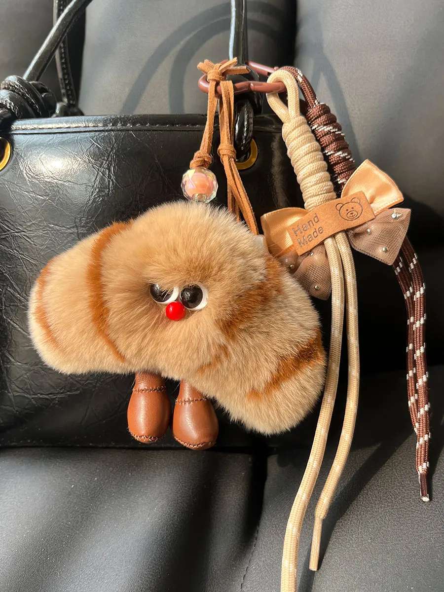 Real Rabbit Fur Croissant Keychain Cute Bread Shape Bag Charm Car Key Ring Plush Pendant Key Holder Kawaii Car Accessories
Real Rabbit Fur Croissant Keychain Cute Bread Shape Bag Charm Car Key Ring Plush Pendant Key Holder Kawaii Car Accessories