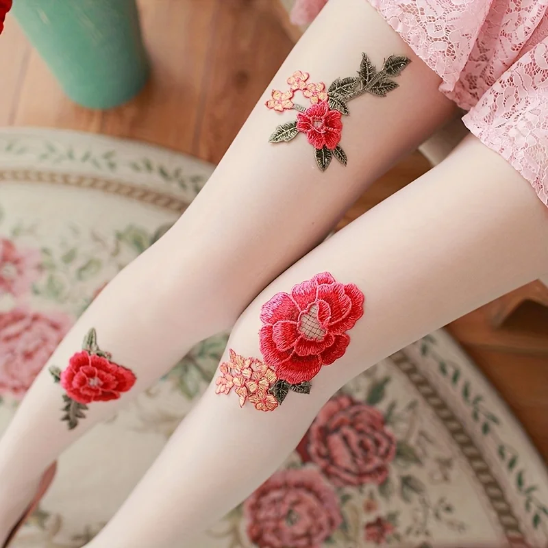 A pair of women's stockings, with a bright red rose pattern on the outside, suitable for daily wearand material is thin socks.
A pair of women's stockings, with a bright red rose pattern on the outside, suitable for daily wearand material is thin socks.