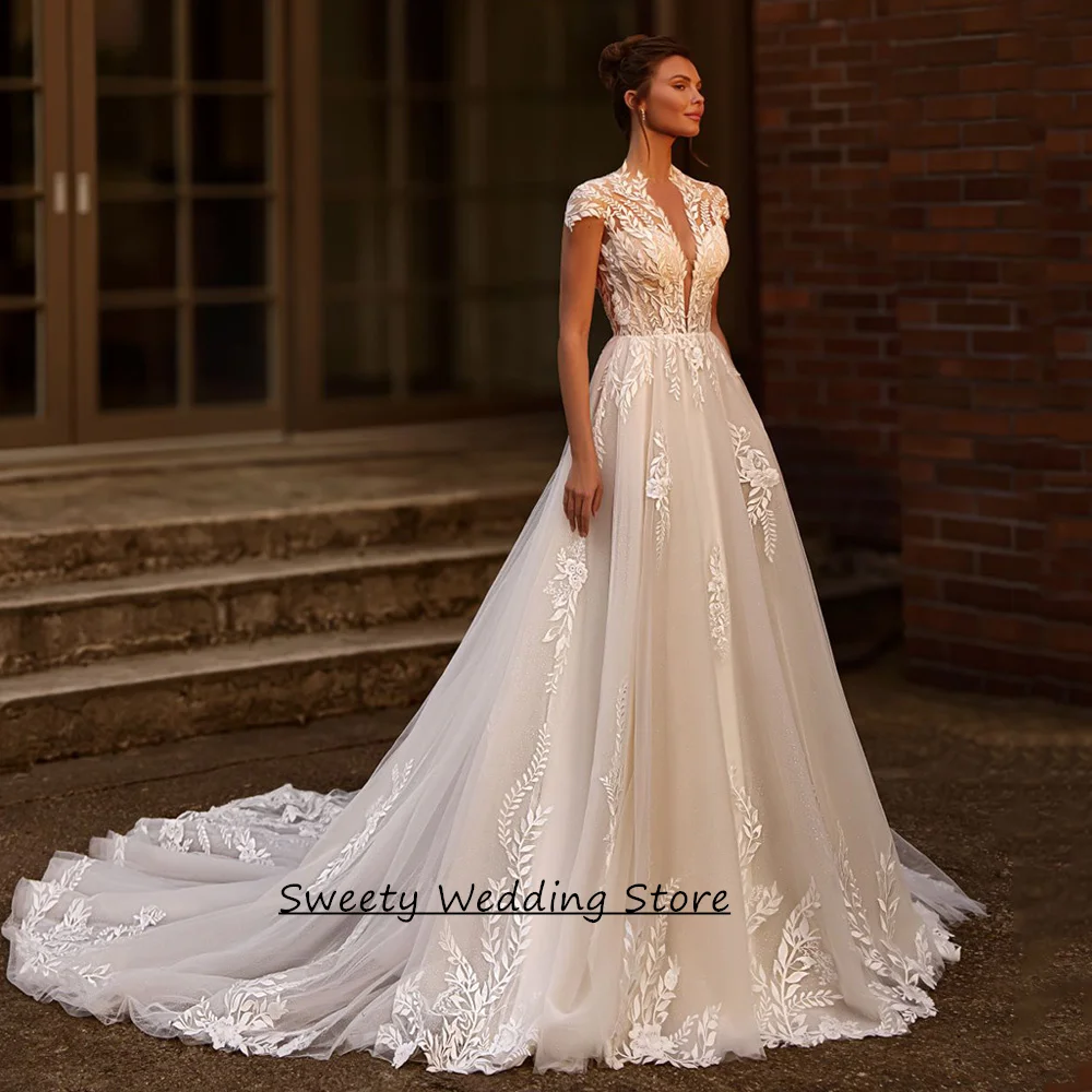 Stunning Glitter Wedding Dress Open Back Customized V Neck Cap Sleeve Applique Court Train Vestidos De Novia Bride Gown
Stunning Glitter Wedding Dress Open Back Customized V Neck Cap Sleeve Applique Court Train Vestidos De Novia Bride Gown