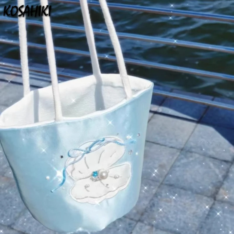 Fashion Fairy Shell Embroidery Shoulder Bags Y2k Aesthetic All Match Chic Bow Handbags Korean Women Streetwear Ins Underarm Bag
Fashion Fairy Shell Embroidery Shoulder Bags Y2k Aesthetic All Match Chic Bow Handbags Korean Women Streetwear Ins Underarm Bag