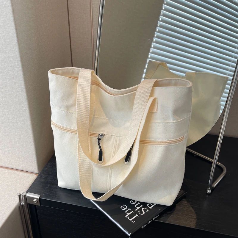 Large Capacity Canvas Bag for Women's Summer Fashion Handheld Student White Collar Commuting Shoulder Bag Tote Bag 2024
Large Capacity Canvas Bag for Women's Summer Fashion Handheld Student White Collar Commuting Shoulder Bag Tote Bag 2024