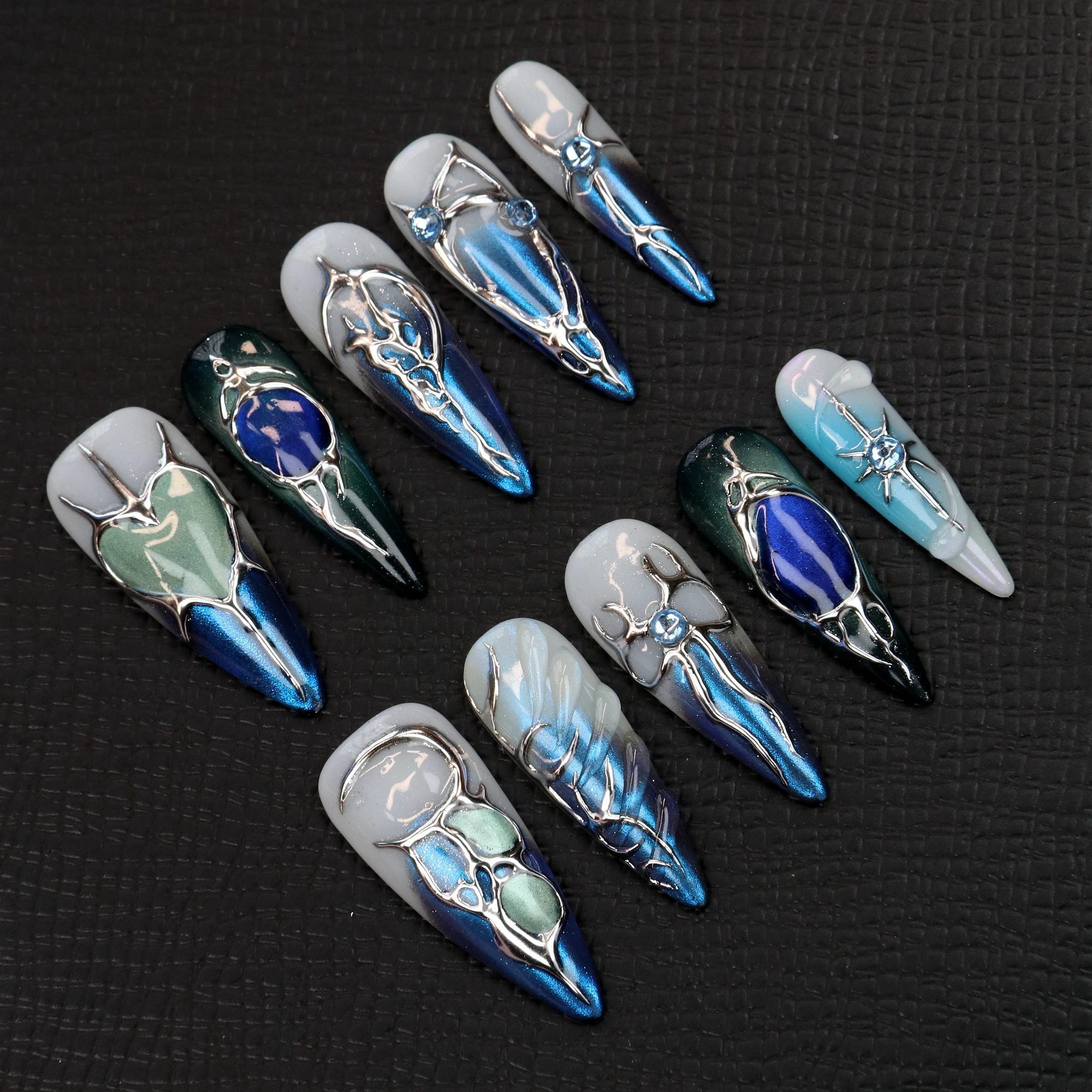 10Pcs Hand-Painted Free-Style Press On Nails,Y2K 3D Acrylic Metallic Crystal Custom Chrome FreeStyle Long Stilett Holiday Nails
10Pcs Hand-Painted Free-Style Press On Nails,Y2K 3D Acrylic Metallic Crystal Custom Chrome FreeStyle Long Stilett Holiday Nails