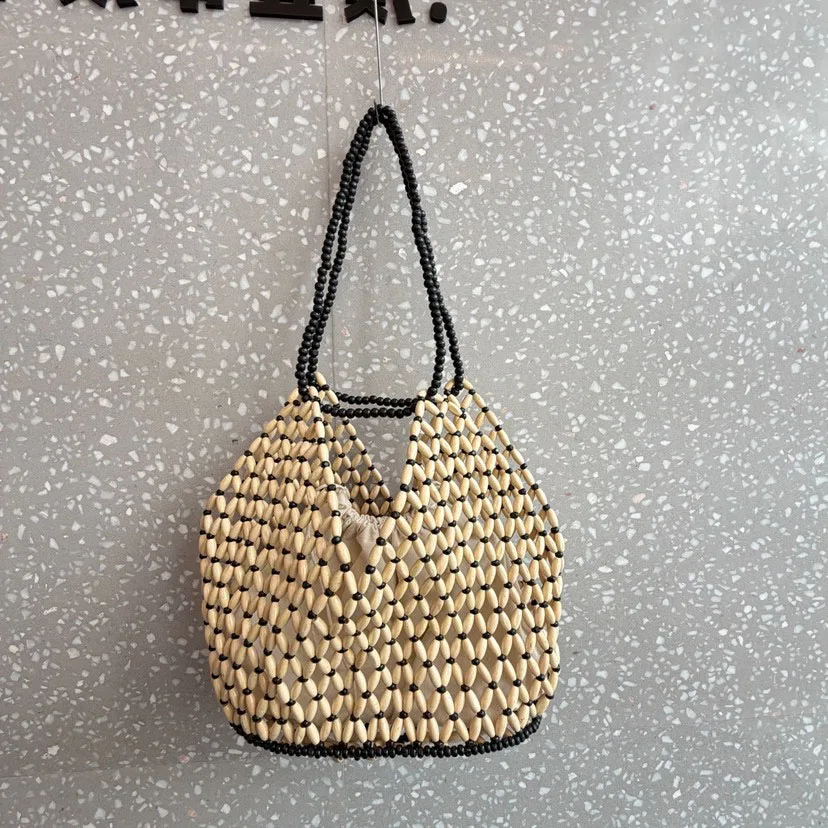 Женская сумка-ведро ручной работы с деревянными бусинами, ажурная, на плечо, летняя, повседневная, модная, для отпуска
Женская сумка-ведро ручной работы с деревянными бусинами, ажурная, на плечо, летняя, повседневная, модная, для отпуска