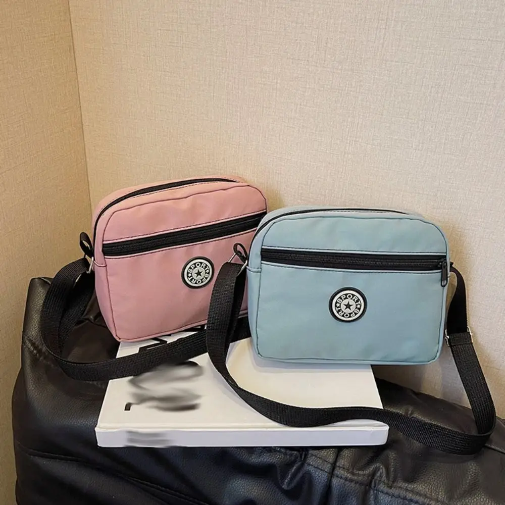Multi-functional Zipper Crossbody Bag Niche Design Nylon Shoulder Bag Solid Color Korean Style Small Phone Bag Storage Bag
Multi-functional Zipper Crossbody Bag Niche Design Nylon Shoulder Bag Solid Color Korean Style Small Phone Bag Storage Bag