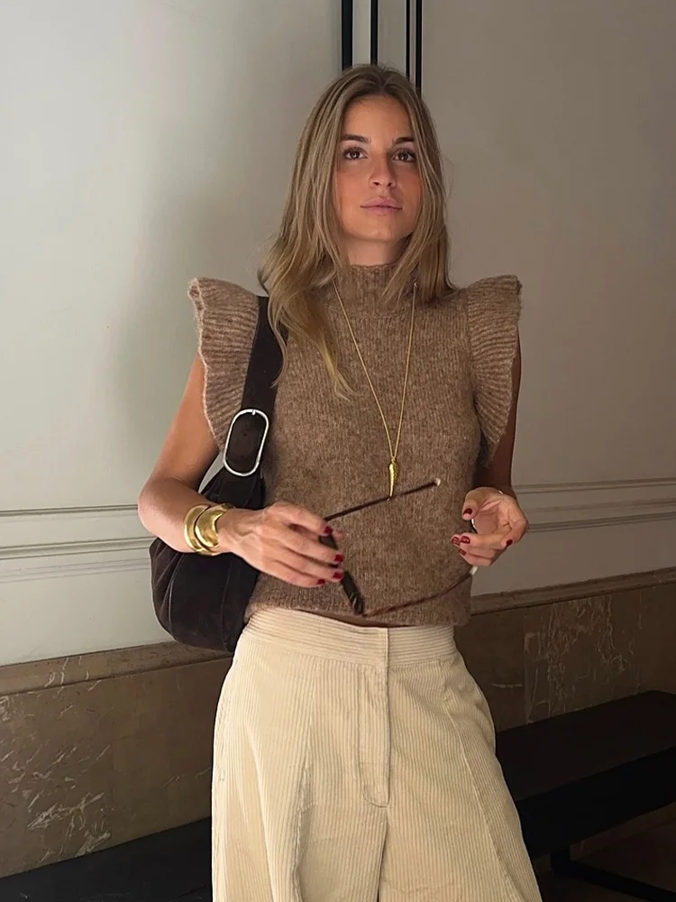 HH женский модный простой универсальный шерстяной многослойный декоративный пуловер 2025 года, женский вязаный топ без рукавов с воротником-стойкой и оборками
HH женский модный простой универсальный шерстяной многослойный декоративный пуловер 2025 года, женский вязаный топ без рукавов с воротником-стойкой и оборками