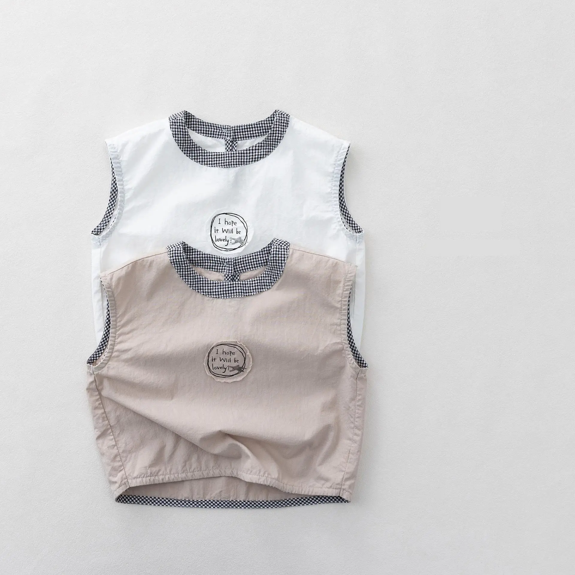 2026 Summer New Children Sleeveless T Shirts Boys Fashion Letter Patch Vest Baby Girls Thin Simple Cotton Tops Kids Clothes
2026 Summer New Children Sleeveless T Shirts Boys Fashion Letter Patch Vest Baby Girls Thin Simple Cotton Tops Kids Clothes