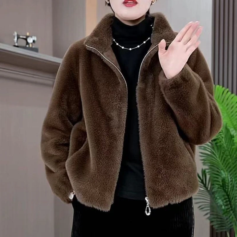 Autumn Winter New Fashion Stand Collar Long Sleeve Mink Fur Solid Coats Women's Clothing Loose All-match Zipper Trend Chic Tops
Autumn Winter New Fashion Stand Collar Long Sleeve Mink Fur Solid Coats Women's Clothing Loose All-match Zipper Trend Chic Tops
