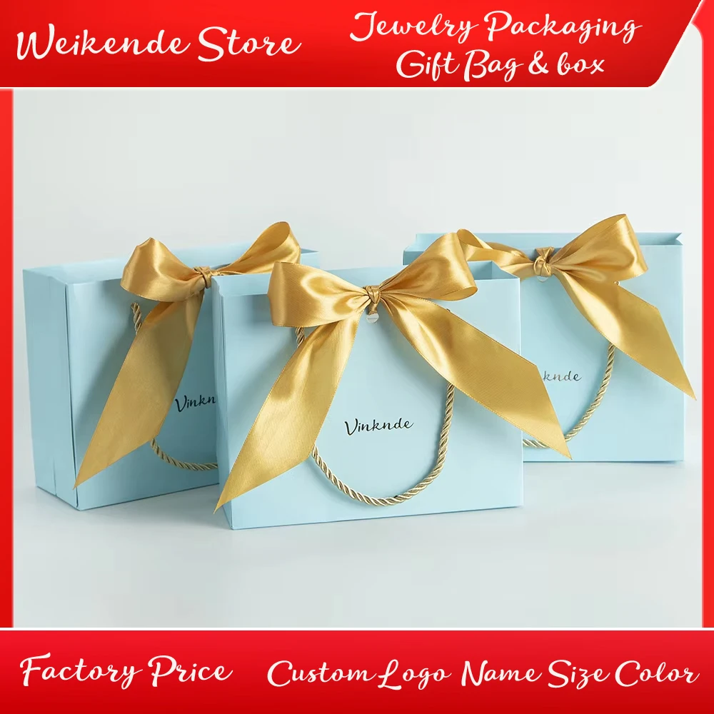 Custom Logo Blue Paper Tote Bag Wedding Favor Bags with Bow Gold Ribbon Handle Bulk for Shopping Party Bridesmaid Anniversary
Custom Logo Blue Paper Tote Bag Wedding Favor Bags with Bow Gold Ribbon Handle Bulk for Shopping Party Bridesmaid Anniversary