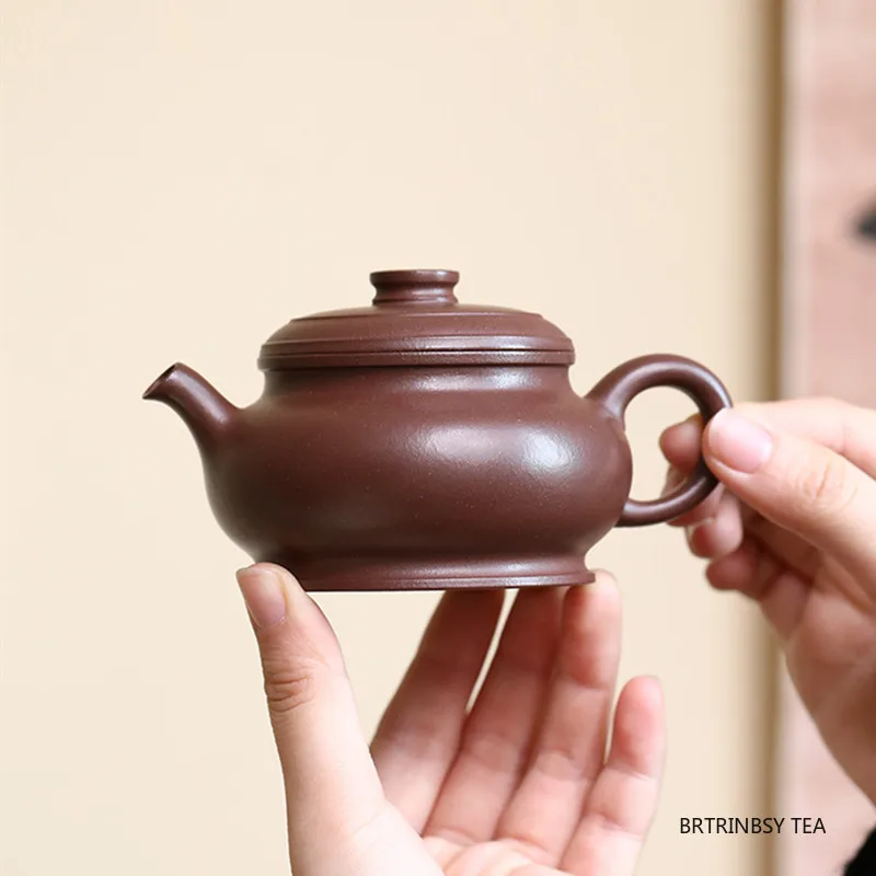 150ml Tradition Yixing Purple Clay Teapot Household Handmade Tea Pot Beauty Tea Infuser Kettle Chinese Zisha Teaware Tea Set
150ml Tradition Yixing Purple Clay Teapot Household Handmade Tea Pot Beauty Tea Infuser Kettle Chinese Zisha Teaware Tea Set