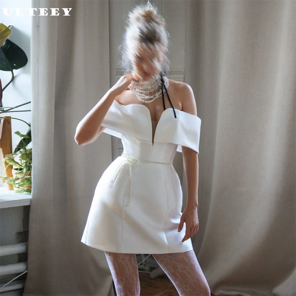 UETEEY Customized Simple Off Shoulder V Neck Satin Sheath A Line Wedding Dress Elegant Zipper Back Above Knee Bridal Gown
UETEEY Customized Simple Off Shoulder V Neck Satin Sheath A Line Wedding Dress Elegant Zipper Back Above Knee Bridal Gown